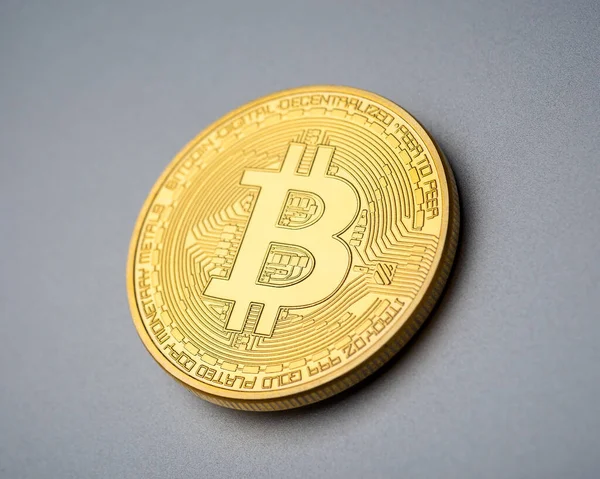 Bitcoin munt op geborsteld aluminium achtergrond Stockafbeelding