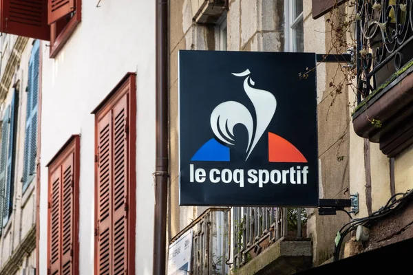 Le Coq Sportif sign outside shop in Bayonne, France Лицензионные Стоковые Изображения