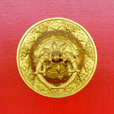 Golden door knocker at Kapan buddhist monastery