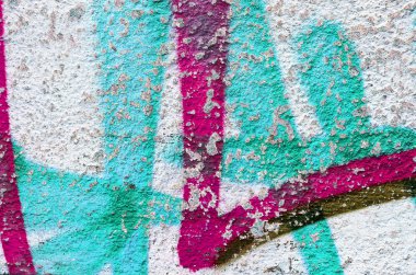 Güzel sokak sanatı grafitileri. Şehrin duvarlarına soyut yaratıcı renkler çiziyor. şehir çağdaş kültürü