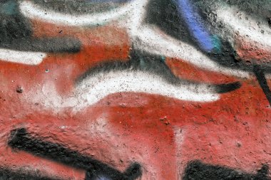 Güzel sokak sanatı grafitileri. Şehrin duvarlarına soyut yaratıcı renkler çiziyor. şehir çağdaş kültürü