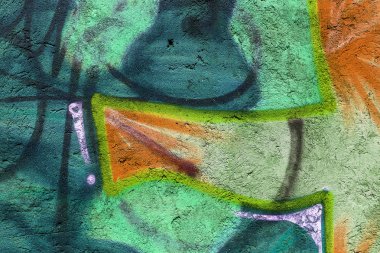 Güzel sokak sanatı grafitileri. Şehrin duvarlarına soyut yaratıcı renkler çiziyor. şehir çağdaş kültürü