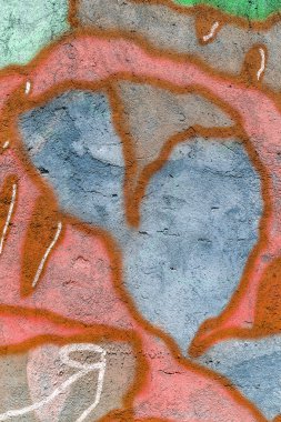 Güzel sokak sanatı grafitileri. Şehrin duvarlarına soyut yaratıcı renkler çiziyor. şehir çağdaş kültürü