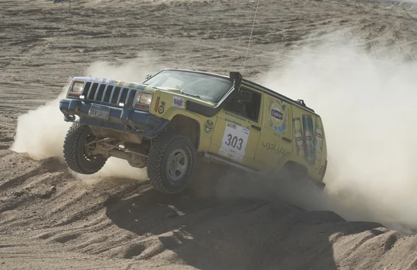 Off-road truck competing in a desert rally — Stock Photo, Image