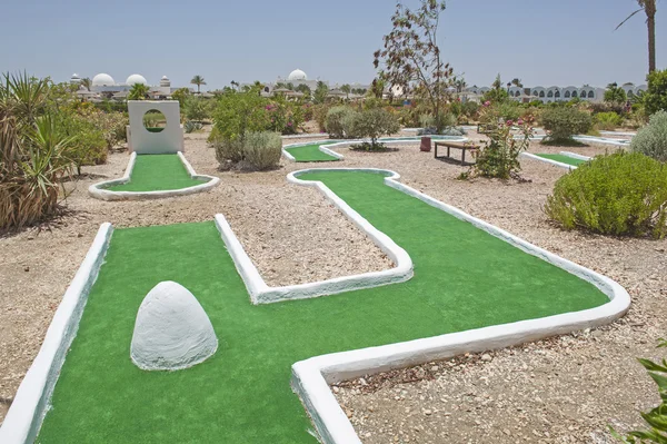 Mini golf course at at tropical hotel resort — Stock Photo, Image