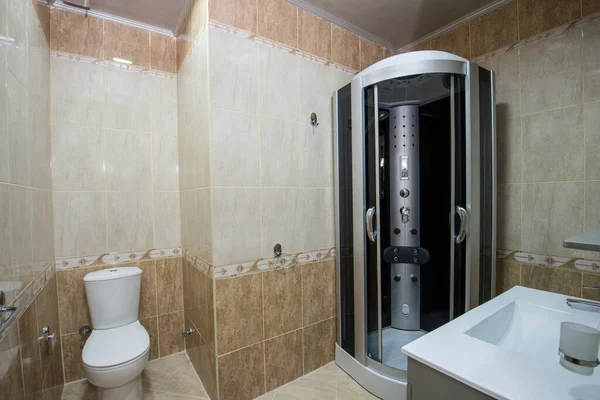 Interior design of a luxury show home bathroom with shower cubicle and sink