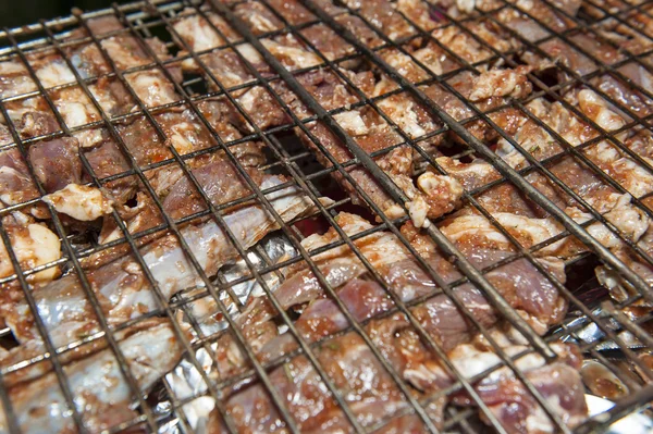 Beef steaks cooking on a BBQ — Stock Photo, Image