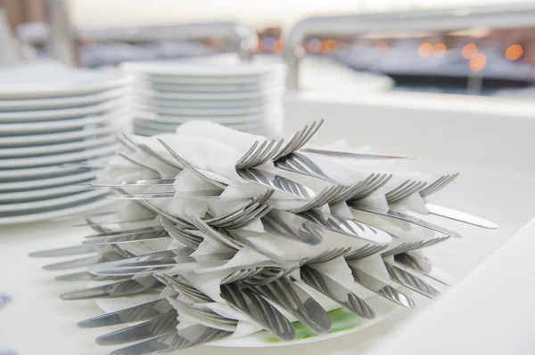 Stack of wrapped cutlery — Stock Photo, Image