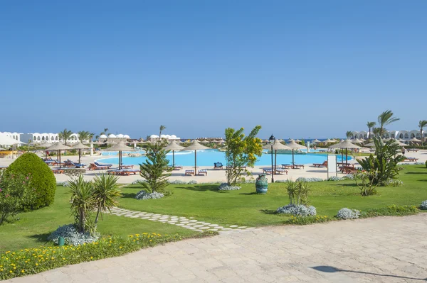 View over tropical resort swimming pool — Stock Photo, Image