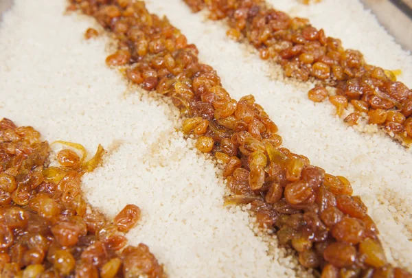 Couscous with raisins at an oriental restaurant buffet — Stock Photo, Image