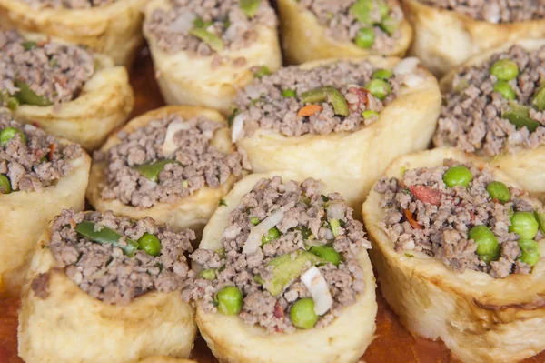 Roasted stuffed potaoes at an oriental restaurant buffet — Stock Photo, Image