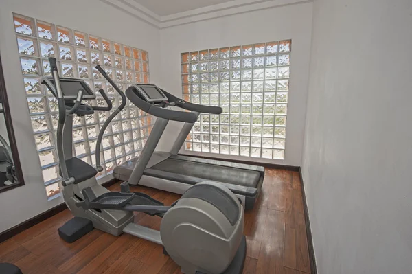 Exercise machines in private gym — Stock Photo, Image