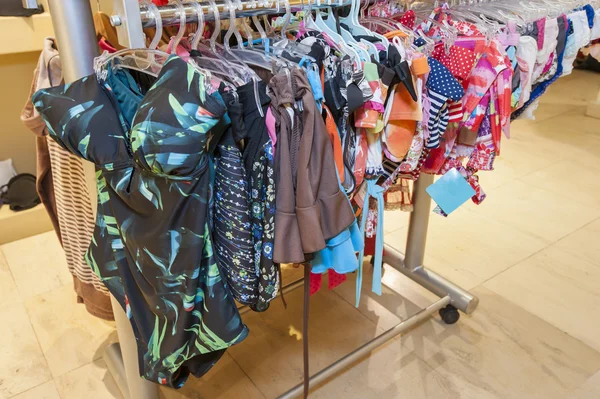 Swimwear on display in clothes shop — Stock Photo, Image