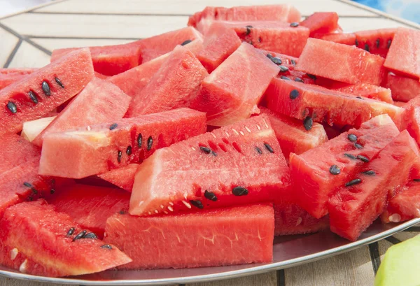 Teller mit frischem Wasser Melone Obst — Stockfoto