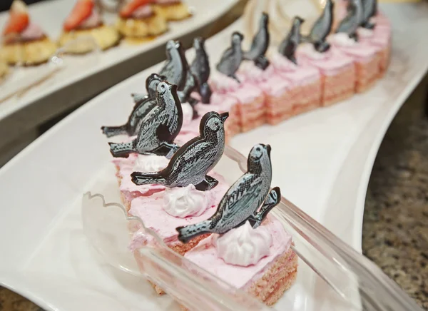 Selection of desserts on display at a restaurant buffet — Stock Photo, Image