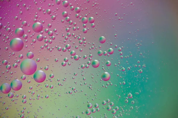 Hermosas Gotas Aceite Arroz Sobre Fondo Colorido Colores Rosa Verde — Foto de Stock