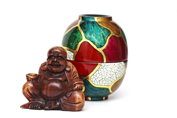 Wooden buddha and cups — Stock Photo, Image