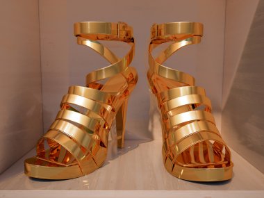 Gold high heels  closeup clipart