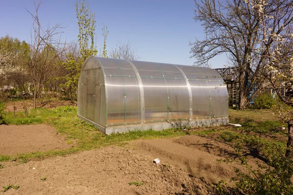 Greenhouse in garden — Stock Photo, Image