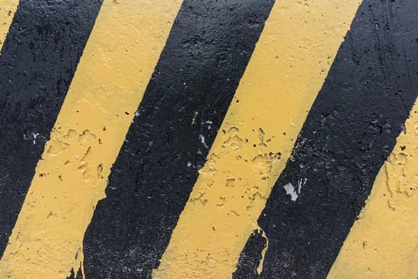 Geel en zwart beton barrière — Stockfoto