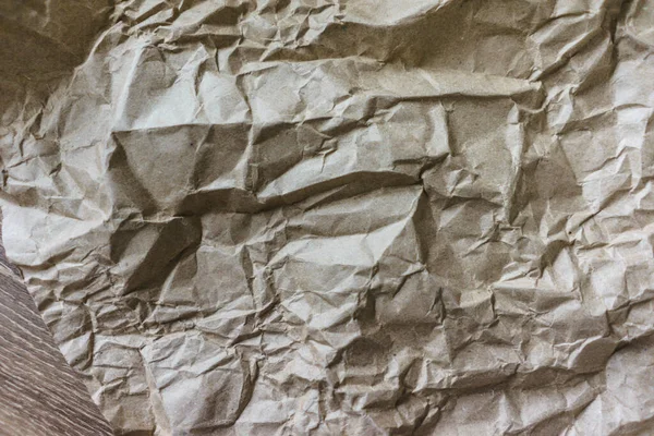 Brown rugas reciclar papel fundo vincado textura de papel bege — Fotografia de Stock