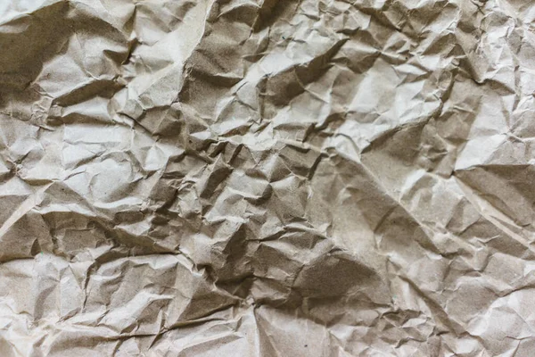 Brown rugas reciclar papel fundo vincado textura de papel bege — Fotografia de Stock