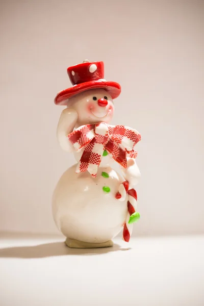 Tarjeta de felicitación con un muñeco de nieve — Foto de Stock