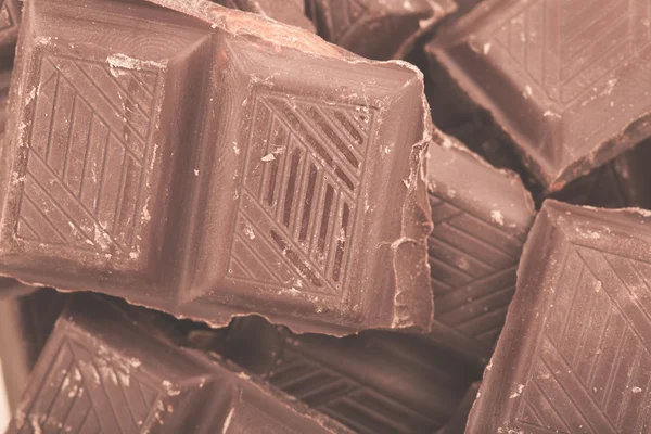 Stukken van melkchocolade — Stockfoto