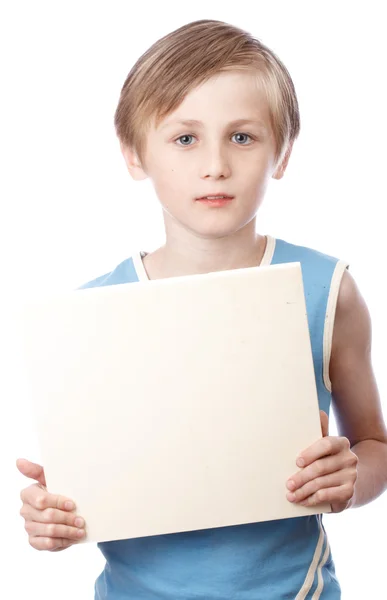 Niño sobre un fondo blanco con el boad en blanco — Foto de Stock