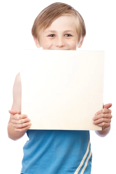 Jongen op een witte achtergrond met lege boad — Stockfoto