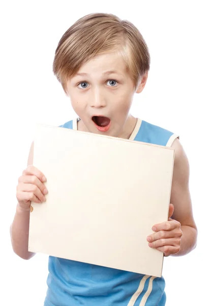 Niño sobre un fondo blanco con el boad en blanco — Foto de Stock