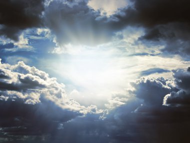 Dramatic skies and rays of light clipart