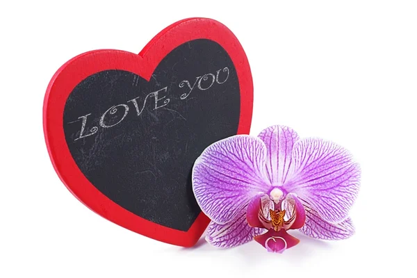 Srdce, Dřevěná deska ve tvaru srdce a orchideje, den svatého Valentýna — Stock fotografie