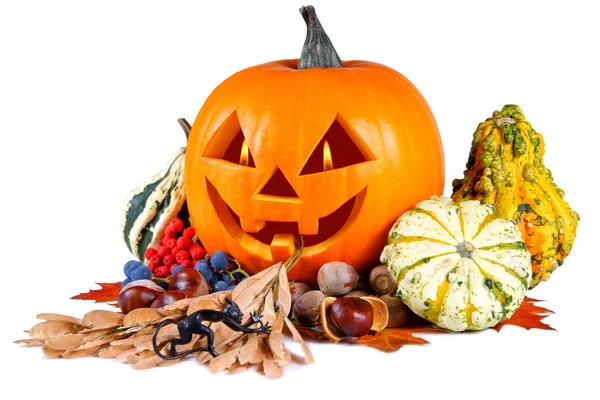 Pumpkin, halloween, old jack-o-lantern on white background with flames in the eyes, composition out of figurine devil — Stock Photo, Image