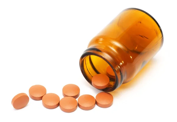 Tablety, kapsle na bílém pozadí, farmacie, medicíny — Stock fotografie