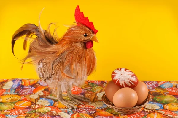 Easter, chicken, egg, on a yellow background — Stock Photo, Image