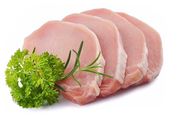 eti, domuz eti, maydanoz, biberiye, dilim domuz loin beyaz bir arka plan üzerinde