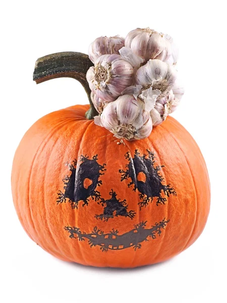 Halloween, pumpkin and garlic on white background — Stock Photo, Image