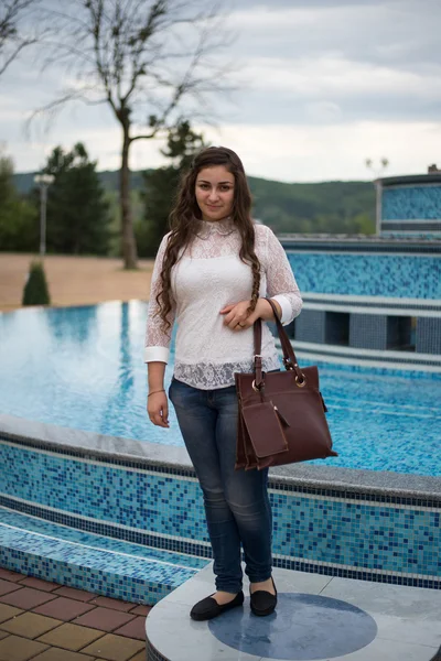 Cute young girl on a walk in the park — Stock Photo, Image