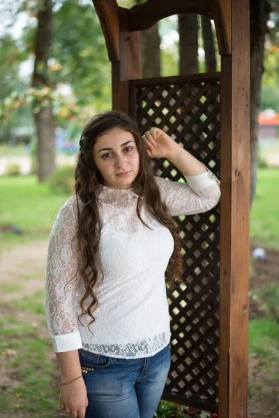 Cute young girl on a walk in the park — Stock Photo, Image