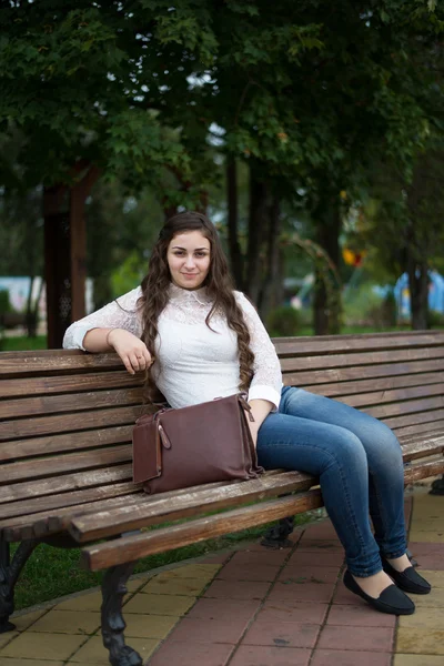 Cute young girl on a walk in the park — Stock Photo, Image