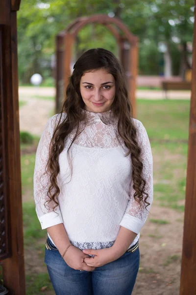 Cute young girl on a walk in the park — Stock Photo, Image