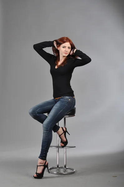 Cute young girl on the shooting in the studio — Stock Photo, Image