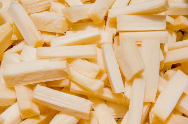 Closeup yığınları içinde yalan şeker kamışı adet ince doğranmış