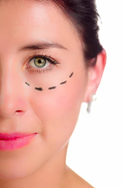 Closeup half of face caucasian woman with dotted lines drawn around left eye, preparing cosmetic surgery — Stock Photo, Image