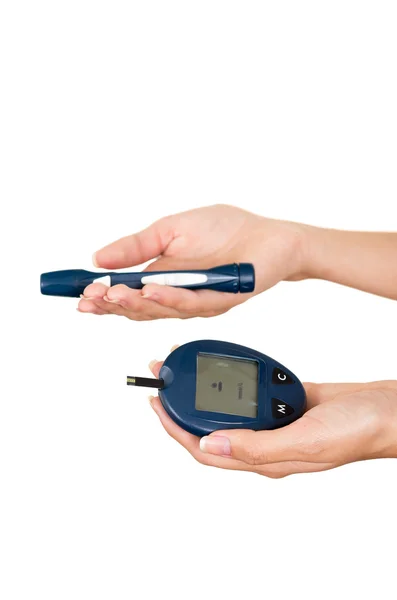 Hands holding glucose meter scanner pen and measure monitor in other hand with white background — Stock Photo, Image