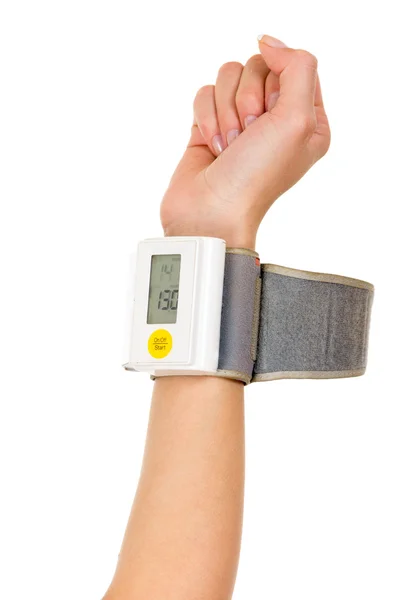 Right arm vertically wearing glucose meter around wrist with white background Stock Photo