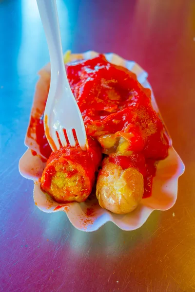 Fast germany food, white traditional sausage covered with ketchup — Stock Photo, Image