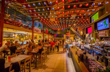 FLORENCE, ITALY - JUNE 12, 2015: Florence street market, perfect place to eat, drink and be with friends. Tourists prefered place to eat traditional food