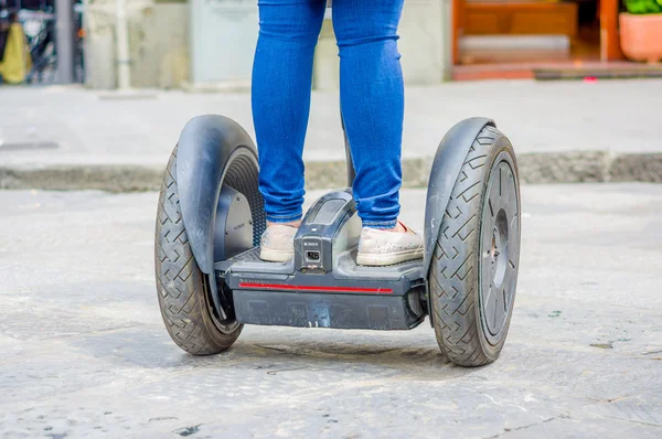 FLORENCE, ITALY - JUNE 12, 2015: Self Balance electronic device calling hoverboard is the new attraction on Florence Italy. Way to transporting more fast
